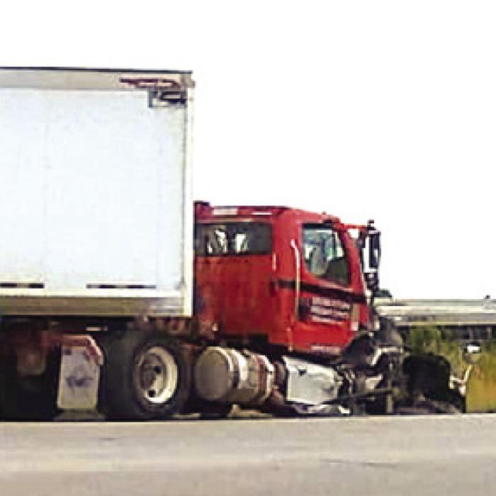 Part of the wreckage from Friday’s accident where an 18-wheeler and a car collided near the Fayette/Bastrop County line.