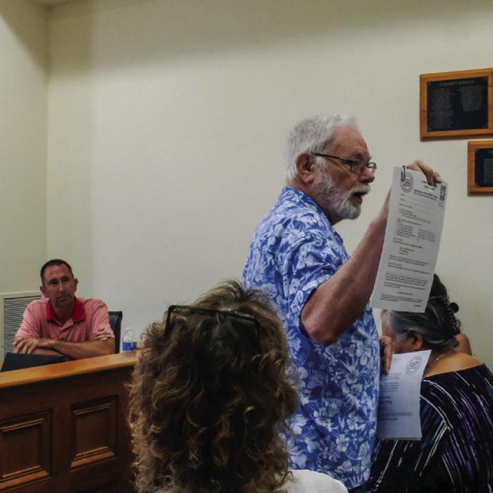 Larry Jackson, Chairman of the Fayette County Semiquincentennial Commission, praised County leaders for assisting with the July 4 Celebration on the Square. He also reminded the public about the Commission’s Liberty Tree project. Photos by Andy Behlen