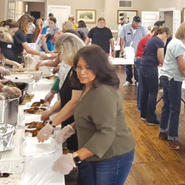 Many volunteers showed up to help make the to-go plates for the Ellinger VFD Feast and Fundraiser.