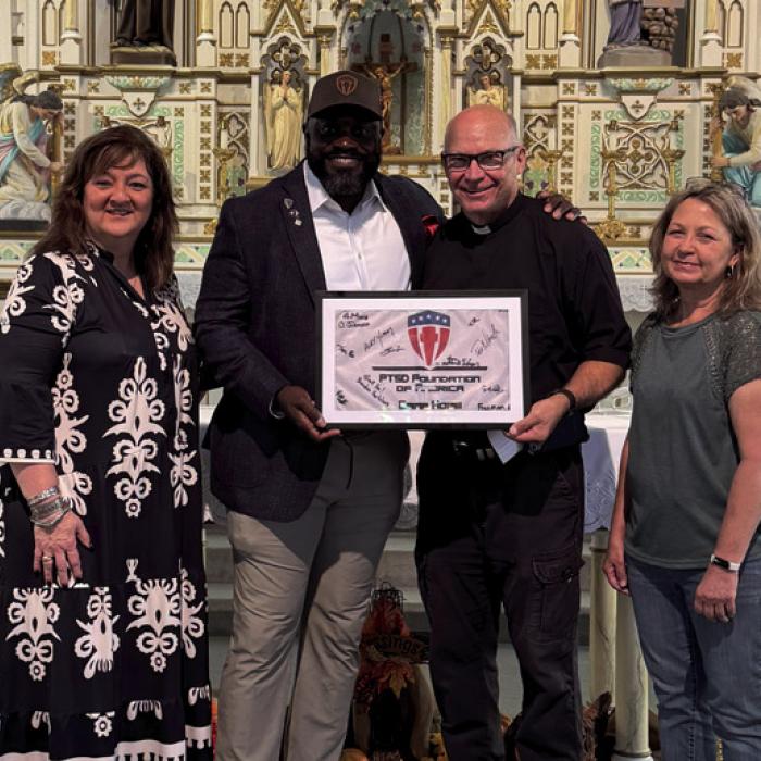 St. Mary’s Camp Hope check presentation.