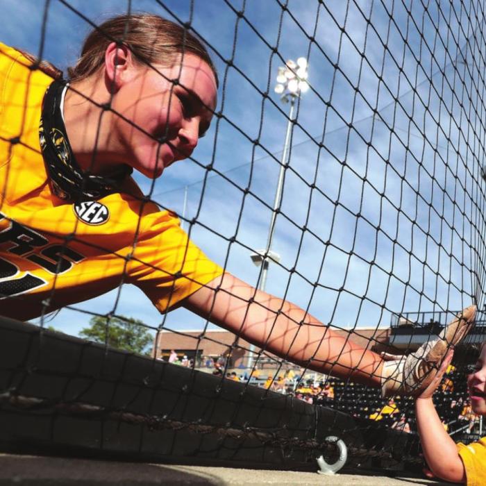 This photo of La Grange’s Hatti Moore high-fiving a young University of Missouri fan before a game last Saturday was actually picked as the NCAA Softball photo of the week in a national contest.