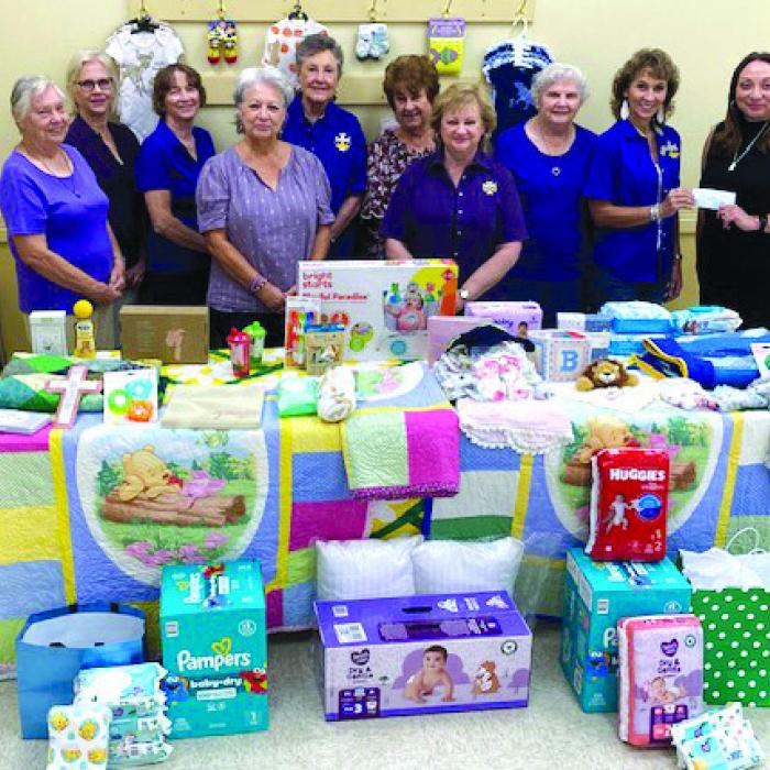 Hostyn Catholic Daughters Make a Donation to the Family Crisis Center