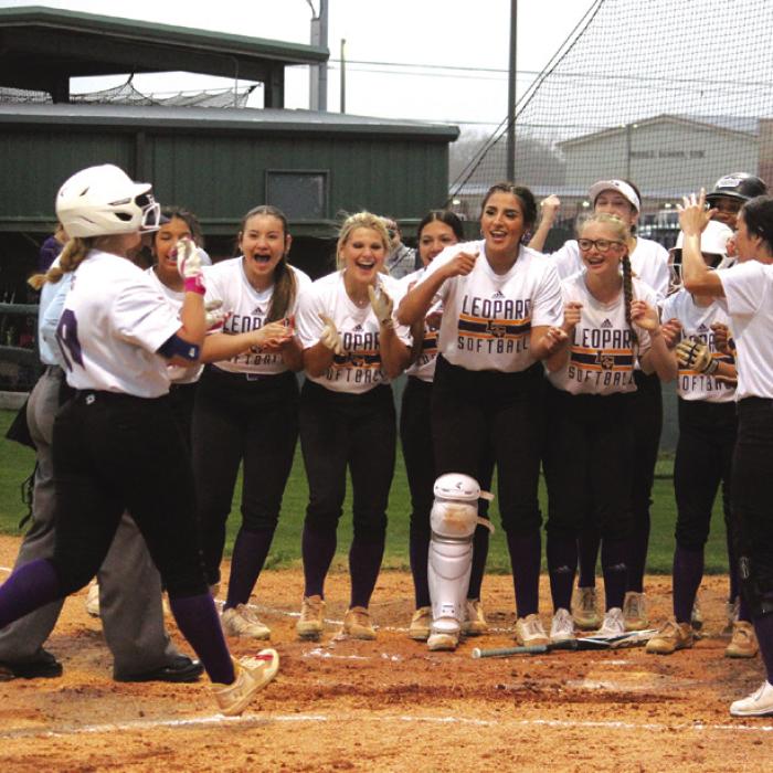 La Grange’s Madi Adams is greeted at home plate after she hit a two-run home run Tuesday. Photo by Jeff Wick