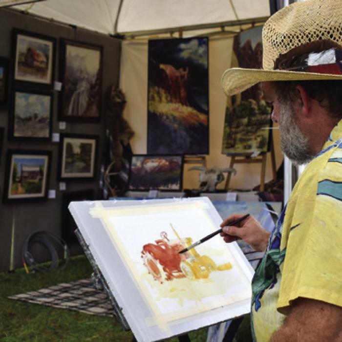 Artist Stephen Henry painting live at last year’s ArtWalk.