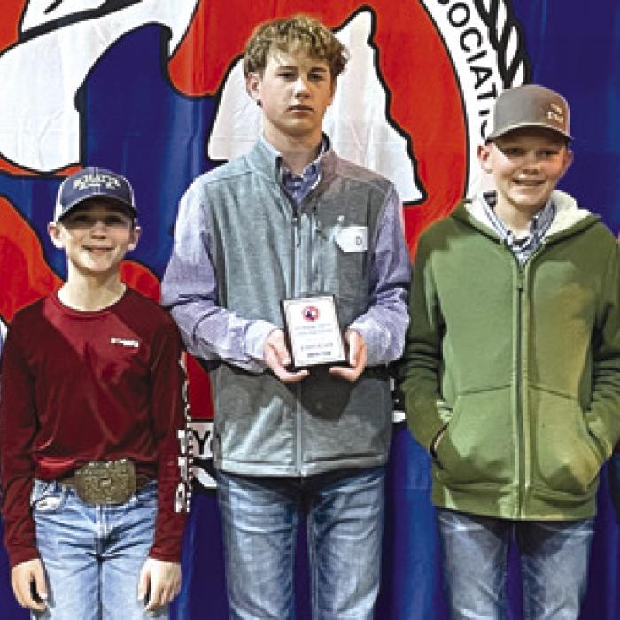 Champion Junior Team: Abraham McBride, Crockett Guenther, Kullen Kutac, Holden Holub and Coach Kaci Carrales.
