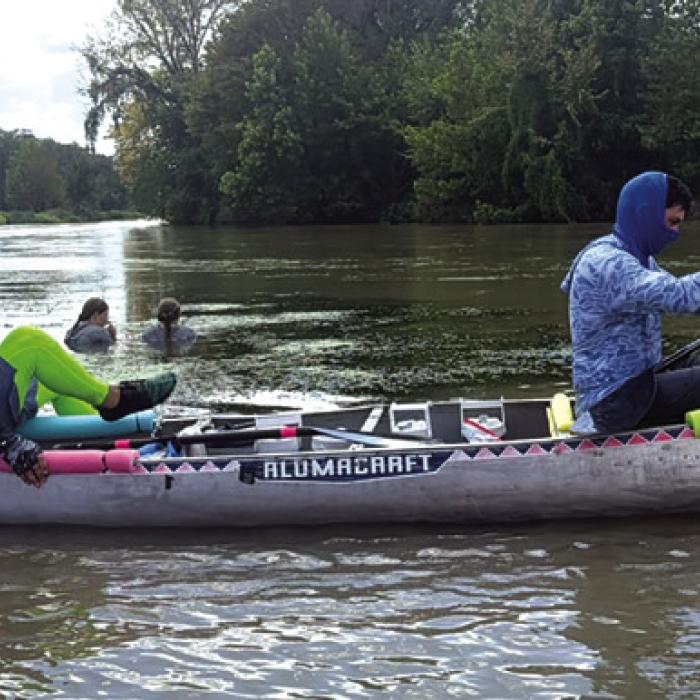 Here’s a photo of the team of Jeremy Simpson and Vince Belcastro getting back on their canoe after a rest stop and checkpoint at Plum Park Saturday Sept. 12. Photo by Jeff Wick