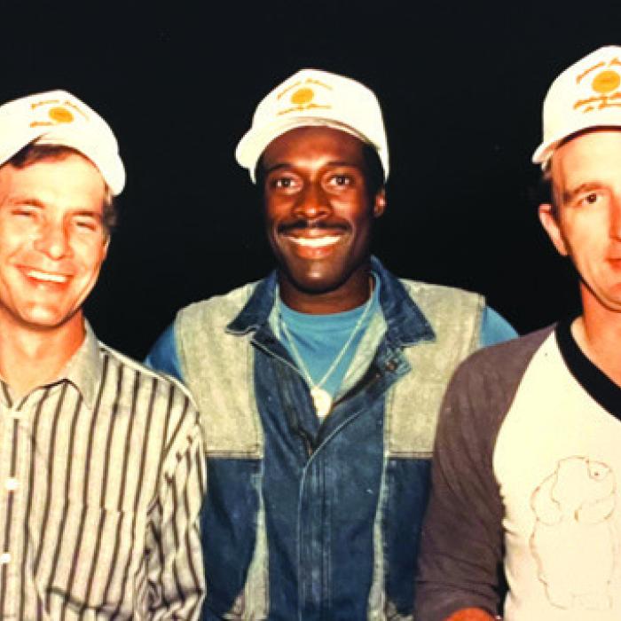 NFL great Johnnie Johnson, center, during a club program in the 1980s.