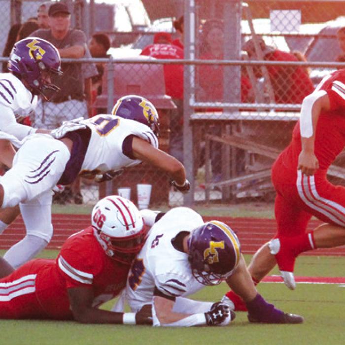 Bellville’s Sam Hranicky runs the ball in for a first quarter touchdown.