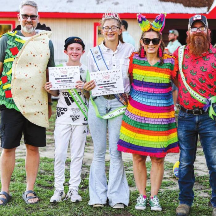 Monster Dash Winners from left: Chris Hooper, Charlie Shank/ Jr. High winner, CJ Prihoda/Adult Female winner, Diane Hooper, Rooster Hoffman/Adult Male winner.