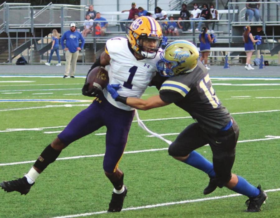 La Grange’s Bravion Rogers fights his way for yardage early in Friday’s game. Photo by Jeff Wick