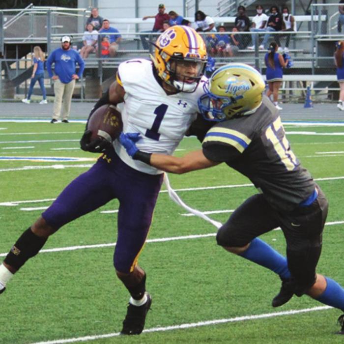La Grange’s Bravion Rogers fights his way for yardage early in Friday’s game. Photo by Jeff Wick