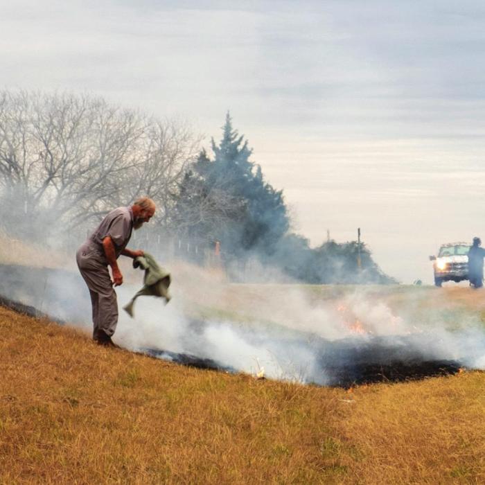 Passerby Stops to Help With Grass Fire