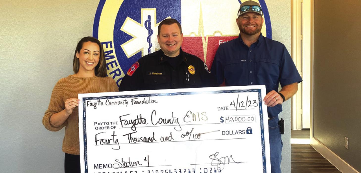 Pictured from left: Susannah Mikulin-Executive Director, Fayette Community Foundation, Josh Vandever-Fayette County EMS Chief, Drew Brossman-Fayette County Precinct 4 Commissioner.