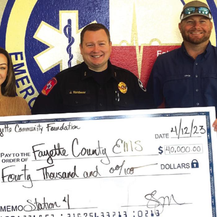 Pictured from left: Susannah Mikulin-Executive Director, Fayette Community Foundation, Josh Vandever-Fayette County EMS Chief, Drew Brossman-Fayette County Precinct 4 Commissioner.