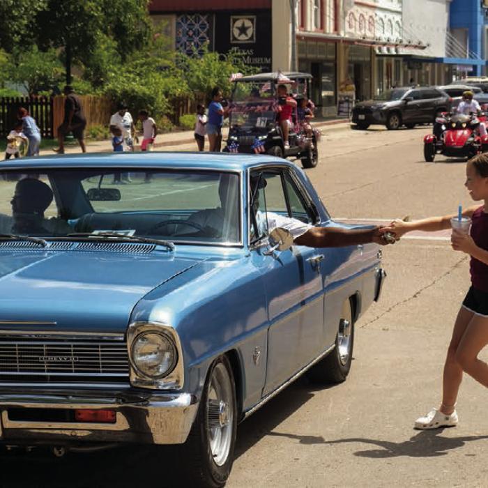 Children stocked up on candy and treats during the La Grange Juneteenth Parade on Saturday. Photos by Andy Behlen