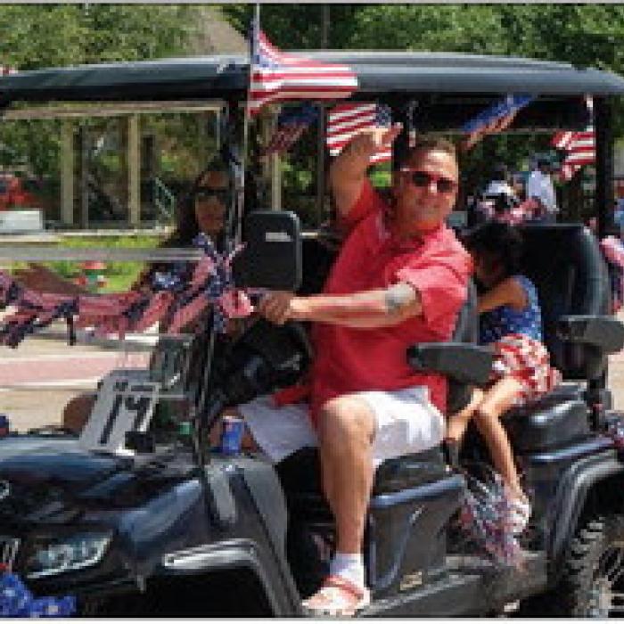 Fayette County Republican Party Chairman Michael Schlabach and his wife Miranda rode in a UTV.