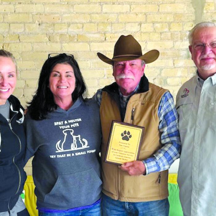 Pictured from left: April Pierson, Director, Teresa Brown, Executive Director, Tom Zapata, Frank Reichert, BOD President.