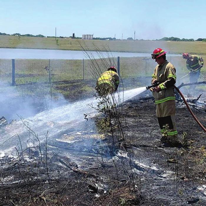 La Grange firefighters put out a small grass fire on Petter Rainosek Loop Sunday afternoon, May 10.
