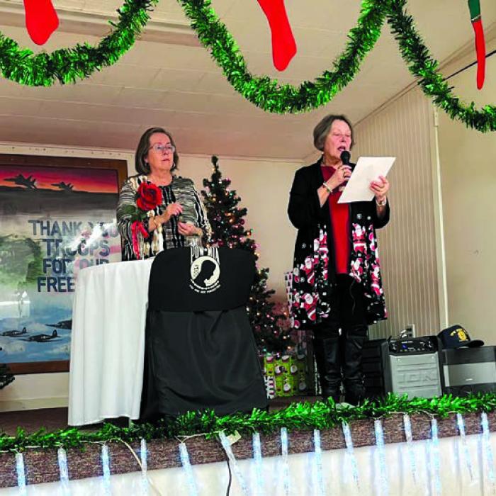 VFW Auxiliary President Marilyn Kothmann and Jr. Vice President Elizabeth Kallus presented the POW/MIA Table - Remembrance Ceremony.