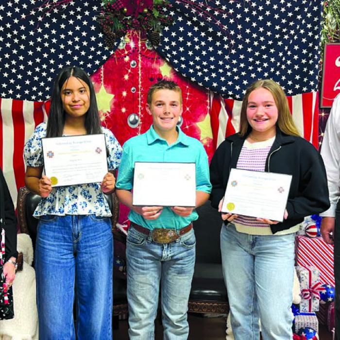 VFW Post 5254 and Auxiliary of La Grange - 2025 Patriot’s Pen winners with presenters from left, VFW Auxiliary President Marilyn Kothmann, third place Angela Soto, second place Teague Weinert, first place Lylah Robertson, and Contest Chairman and VFW Commander Richard Gray.