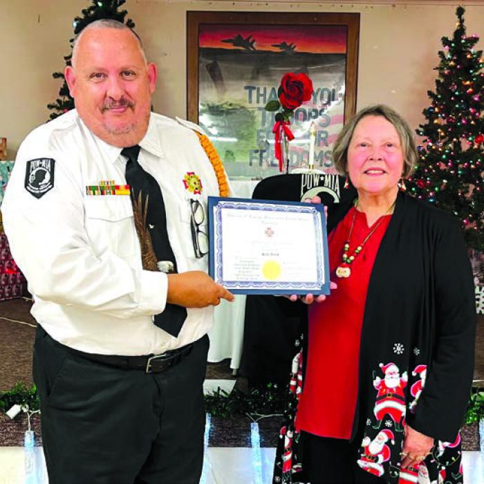 President Marilyn Kothmann presented a VFW Auxiliary 5254 Certificate of Appreciation to VFW Post member Scott Jones for his outstanding continuous promotion of the “Buddy” Poppy Program.