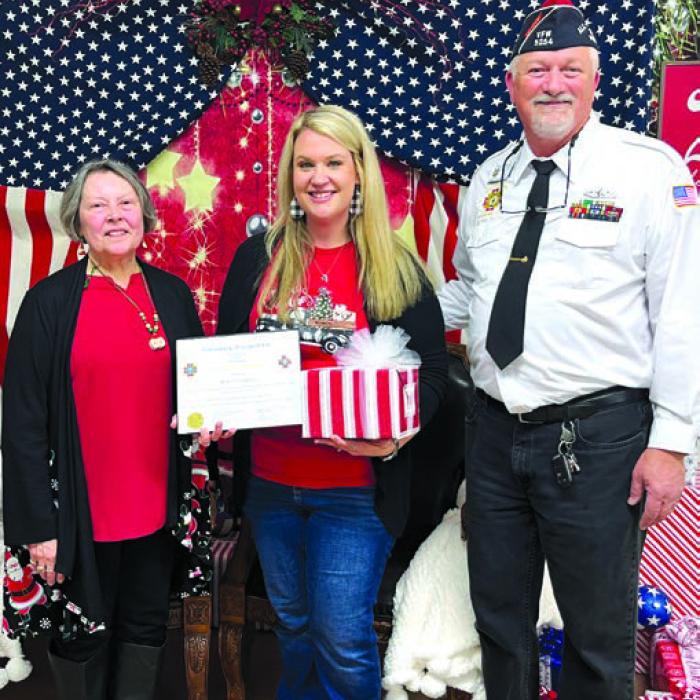 Brandi Venghaus, history teacher at Round Top Carmine Junior High and High School, was presented with a Certificate and Gifts as being chosen Teacher of the Year for VFW Post 5254. She is pictured with VFW Auxiliary President Marilyn Kothmann and VFW Post Commander Richard Gray.