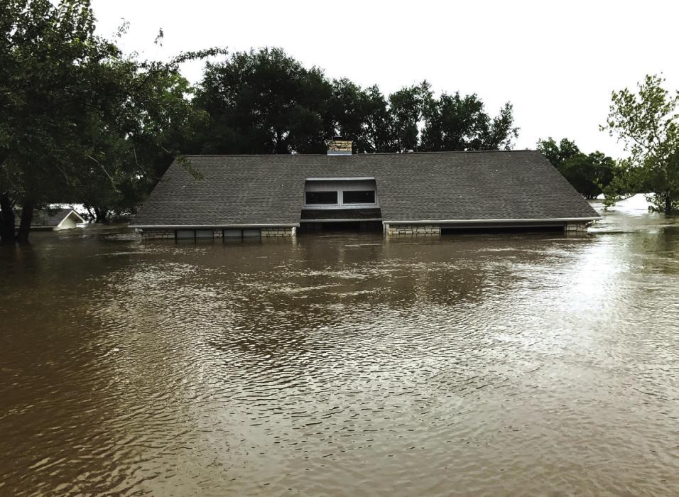 The home of J.P. and Carla Hartley on the Frisch Auf! golf course in La Grange before Hurricane Harvey (left) and during the flooding (right). The Hartleys were never allowed to rebuild and the home still sits abandoned awaiting the buyout process.