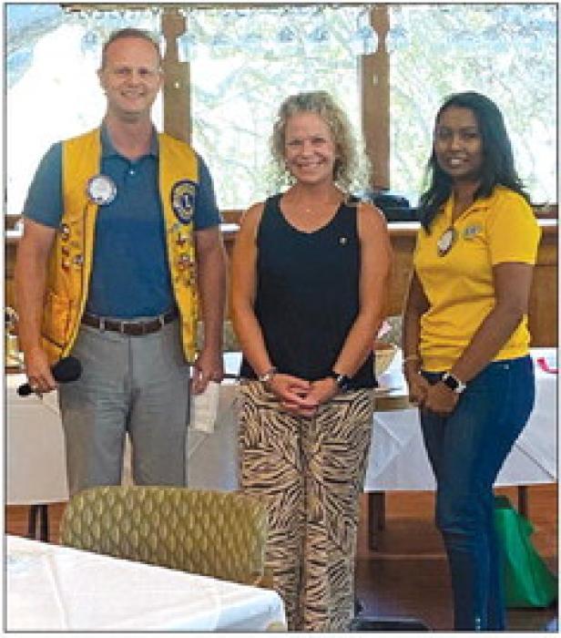 The La Grange Noon Lions Club recently welcomed their newest member, Katherine Raj (center), to the club.