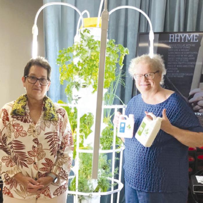 Stephanie Shroyer, Program Director is pictured here with Kathy Aka Glenda Besetzny, her lovely assistant in care of our Tower Garden we have thanks to a grant from Second Chance Emporium.