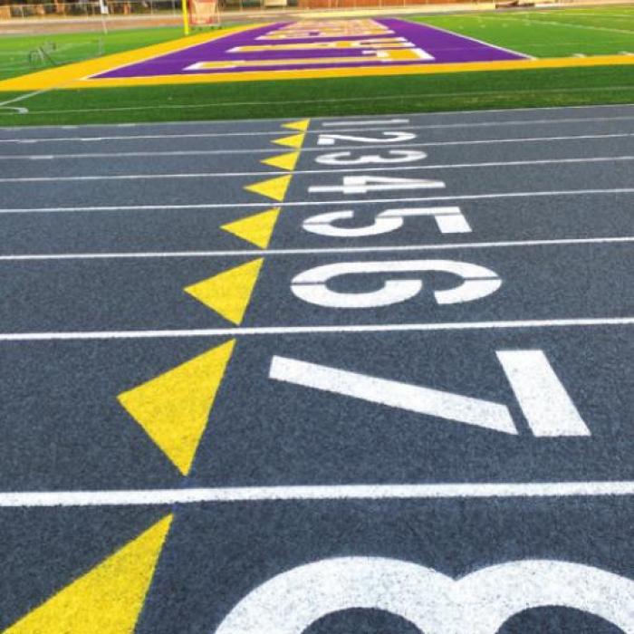 The painting of the new track at Leopard Stadium was one of the final tasks of the new turf and track project there.