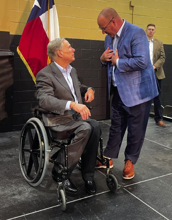Photo by Andy Behlen Fayetteville superintendent Dr. Jeff Harvey expressed his concerns about the voucher proposal to Governor Abbott after the governor’s speech Tuesday.