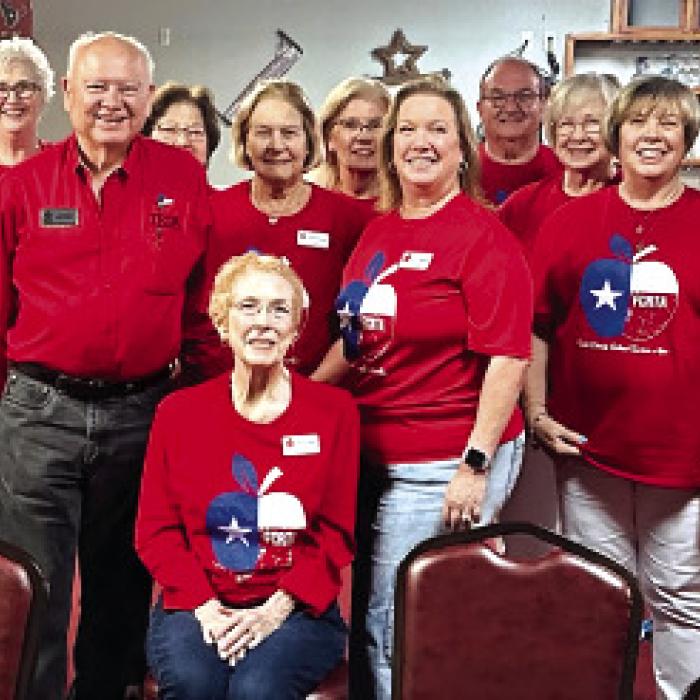 Members pose with Joe Ramirez, District 13 TRTA president.