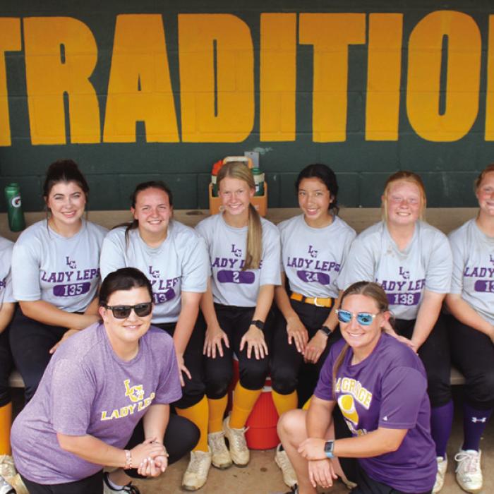 The word ‘TRADITION’ in the La Grange softball dugout says it all as the Lady Leps play in their 26th consecutive postseason.