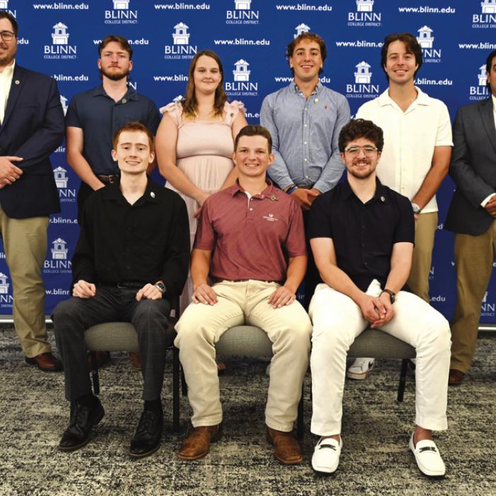 Blinn College paramedic graduates pose for a photo following their recent pinning ceremony. Among the 11 graduates is Sean Patton of Flatonia.