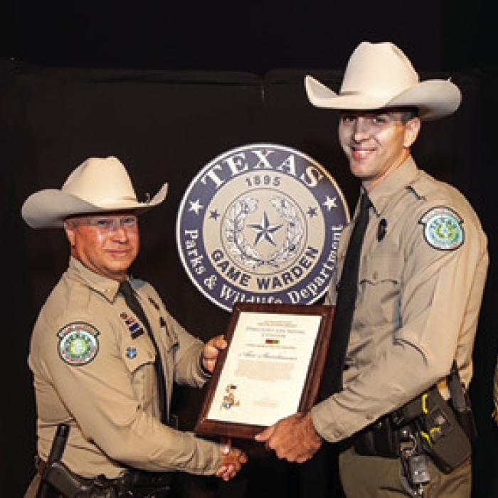 Alex Steinhauser, right, receiving Director’s Life Saving Citation for his heroism earlier this year.