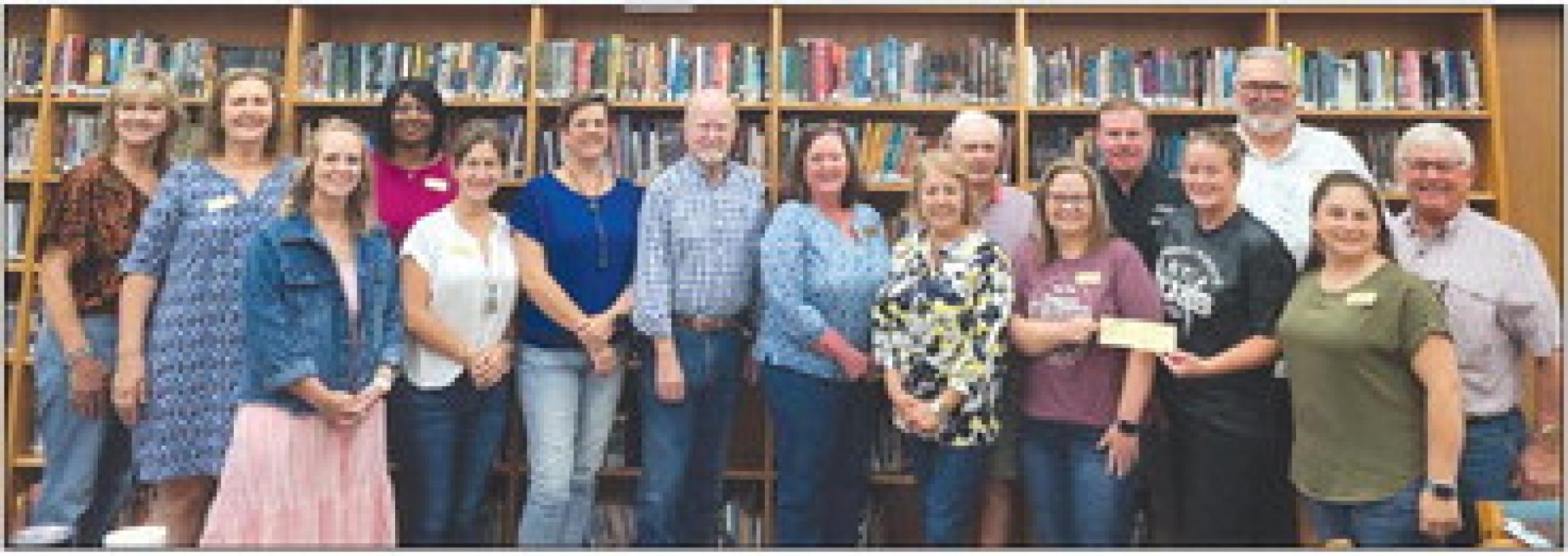 The Round Top-Carmine Education Foundation, in addition to providing over $18,000 in innovation teacher grants and $81,000 in whiteboards and Chromebook technology, presented to the RT-Carmine ISD campus principals $30,000 to support Arts and Music programs. Pictured are Foundation Board members, Foundation Executive Director Linda Patterson, and Campus Principals Amy Weinert, and RaChelle Kuecker.
