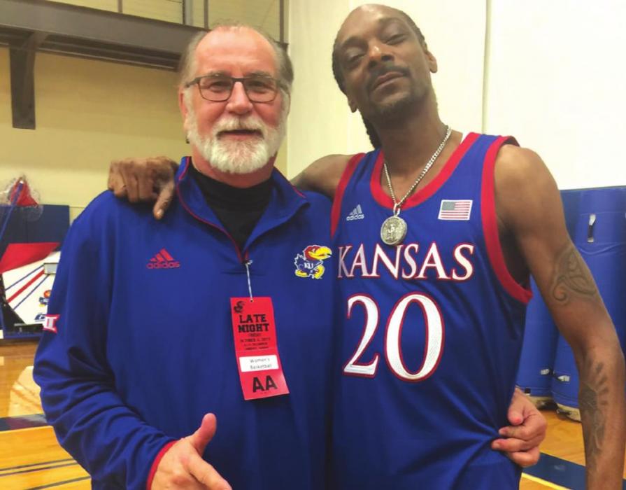 Larry Tidwell hanging out with the rapper Snoop Dogg at an event at the University of Kansas when Tidwell was an assistant coach there.