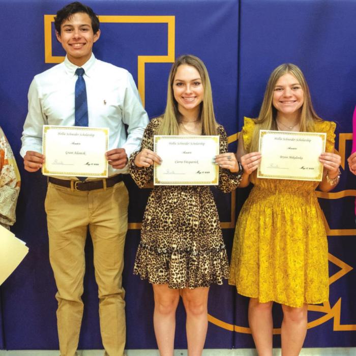 $1.8 Million in Scholarships Given Out to La Grange High School Seniorsrra Fitzpatrick, Brynn Mikulenka and Layne Wied. Presenter was Sheri Schneider.