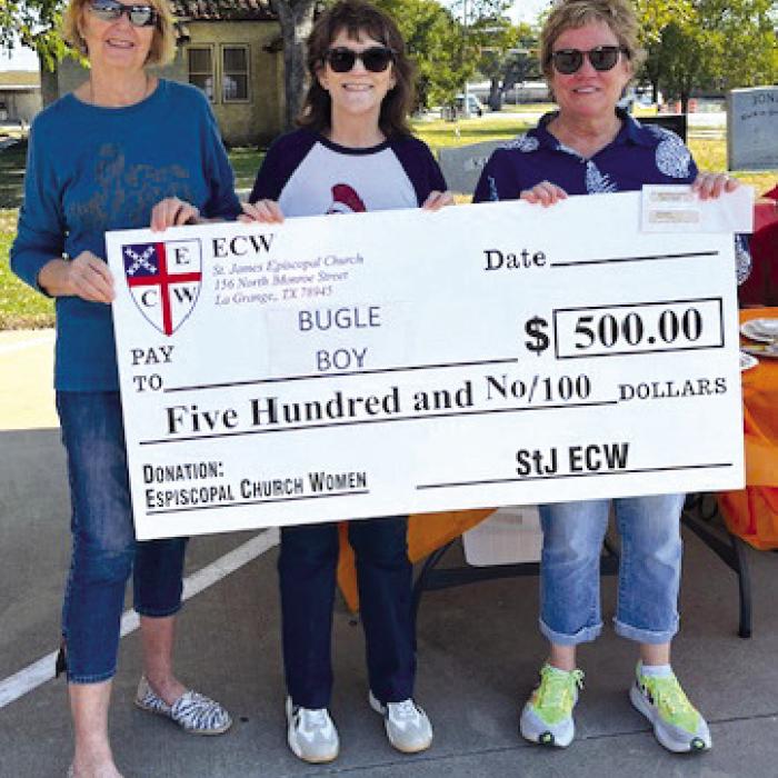 St. James’ Episcopal ECW donated $500 to the Bugle Boy. Pictured from left: Lil Landry, Heather Albright, Bugle Boy Director, and Jane Malik.