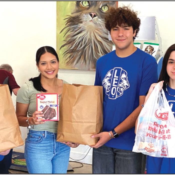The La Grange Leo club recently donated Gobble Kits to Feed The Need food drive. Pictured from left to right: Elizabeth Lehmann Natalia Soto Mitchell Cervantez and Lilly Bell.