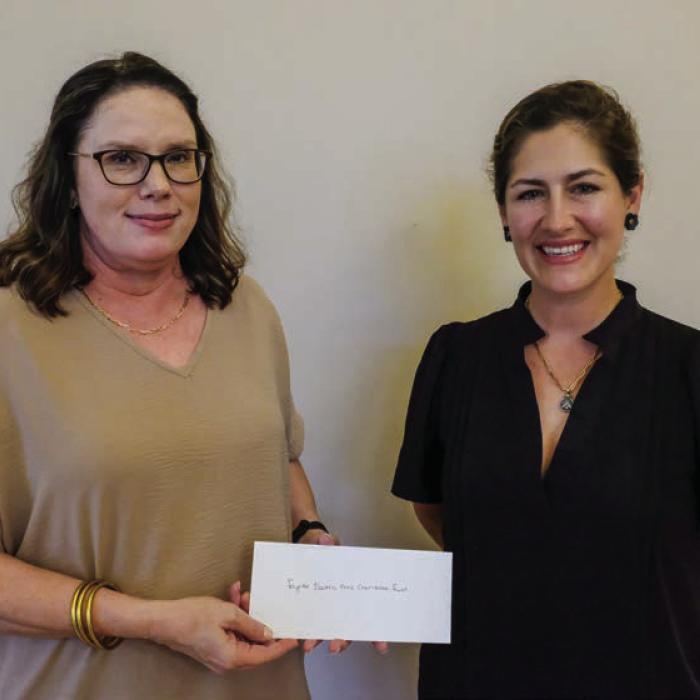 Fayette Electrical Cooperative Charitable Fund received a $2,000 grant from the Texas Women’s League. Pictured are Tracy Denton of Fayette Electric (left) and Sofia Massey of TWL.