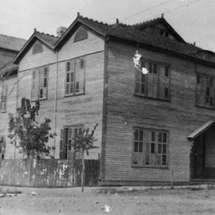The St. Patrick’s Day program was given at the La Grange Opera House, located at the northwest corner of the intersection of Franklin and Colorado Streets where the city hall now stands. The front area along Franklin Street was a library and meeting room. The stage area was at the back of the building, with the audience seated in between on both the ground floor and on a large horseshoe-shaped gallery or balcony overhead.