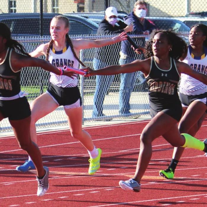 The La Grange and Giddings girls have been fighting it out in the district and area track meets (shown above are both schools in the last leg of the sprint relay at the district meet with La Grange’s Jaylen Reese handing off the baton to Lanie Doyle), and will do so again with lots of qualifiers at this week’s regional meet in League City, with state berths on the line. Photo by Jeff Wick