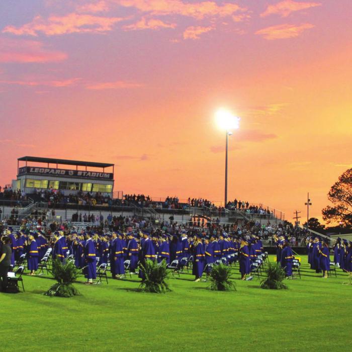 An evening of powerful storms in the area gave way to a beautiful purple and gold sunset for the graduation ceremony for the La Grange Class of 2020 Thursday. Photo by Jeff Wick