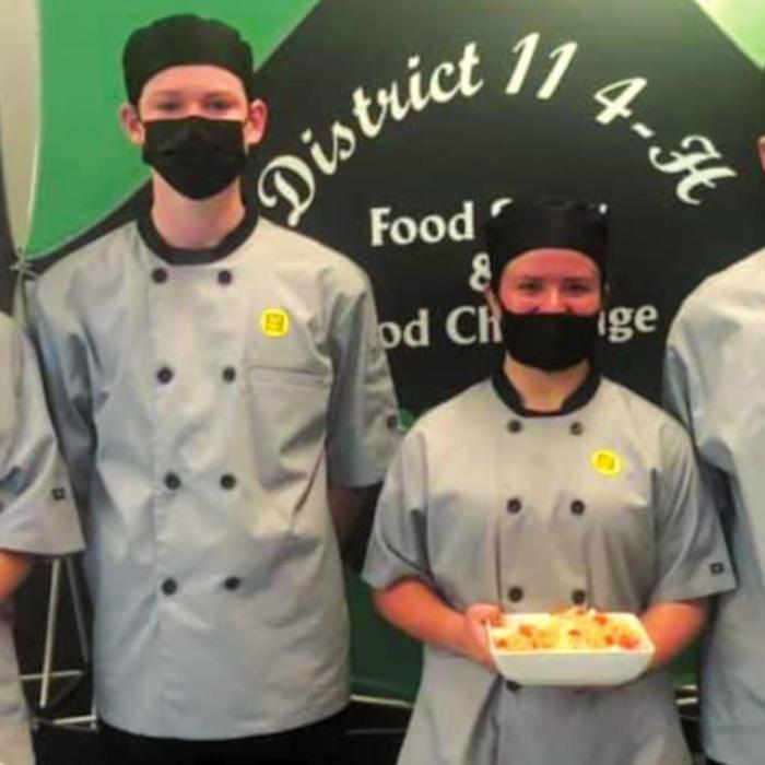 District 11 4-H Food Challenge winners: 2 Hot 2 Handle team members Karson Corn, Cash Smith, Mackenzie Poncik and Copper Mau.
