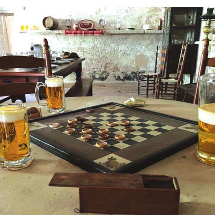 Shown here are parlor games in the Historic Kreische House.