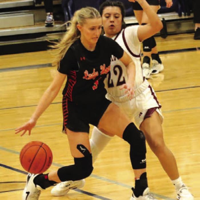 Schulenburg’s stellar girls basketball season came to an end Friday in Caldwell as the Lady Horns lost to Iola 47-42. The Lady Horns end their season with a 25-9 overall record. Here Jenna Guentert dribbles the ball during Friday’s playoff game. Photo by Audrey Kristynik