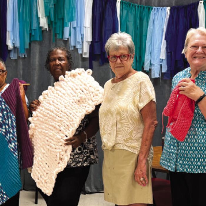 Women in the Artful Friday Crochet class, led by Sheryl Tumis, showed off their art projects at the last class. Pictured from left: Kim Penland, Deborah Jones, Janice Collins, Frida Ellison, Sheryl Tumis, Joan Ulrich, and Leona Lange.