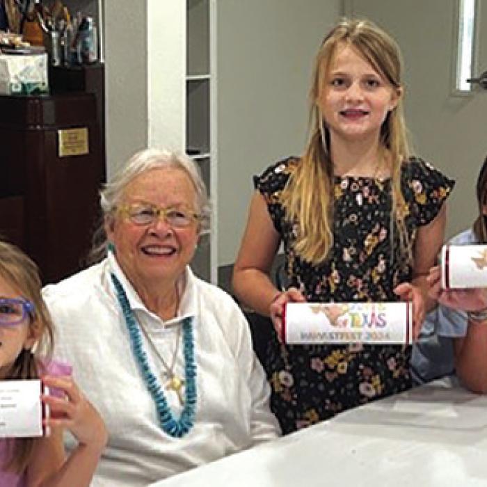Sally Reynolds, Round Top author and arts enthusiast, will be recognized Thursday as the Runway 159 Style Icon. This group picture features from left to right: Lincoln Moreau, Sally Reynolds, Maddison Moreau, and Scout Farley.
