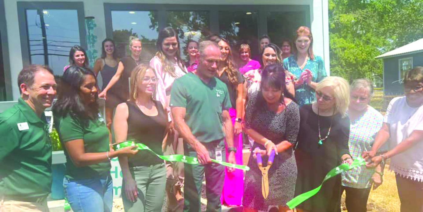 Hello Beautiful Day Spa and Laser Center in La Grange held their ribbon cutting on Thursday, Aug. 24. April Marie Krhovjak, owner, cuts the ribbon at the opening of their new location at 520 W. Colorado St.